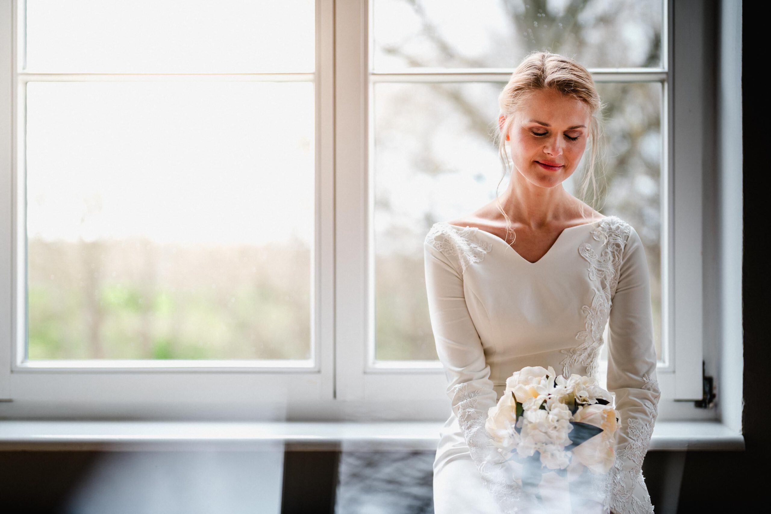 hochzeitsfotos hochzeitsfotograf hannover hochzeitsfotograf stephan groeger braut am fenster